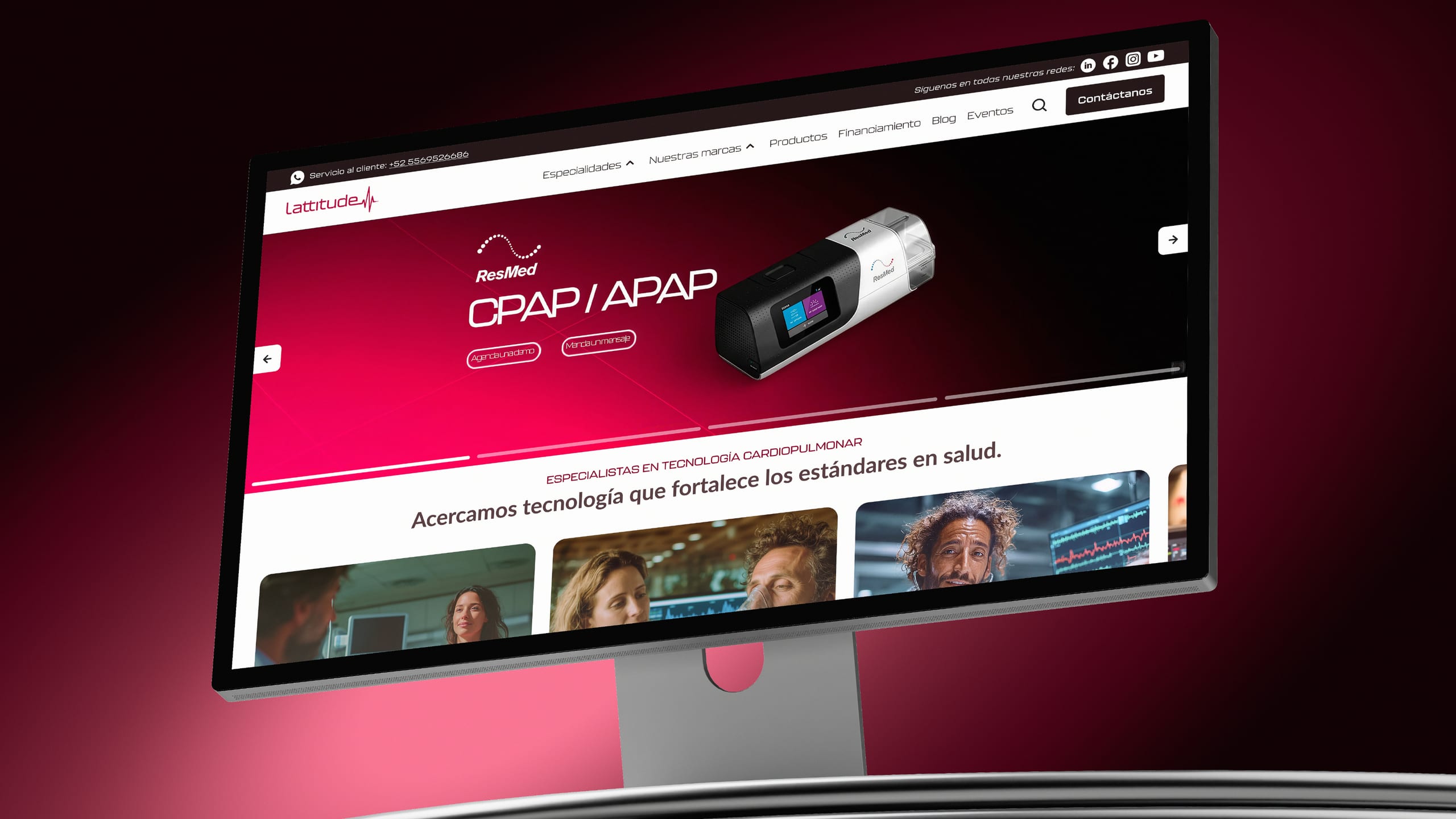 Desktop monitor on a dark surface showing the Lattitude cardiovascular technology homepage with a magenta hero.