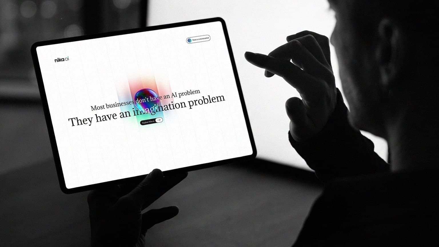 Nika AI homepage on an iPad with an interactive iridescent 3D orb.